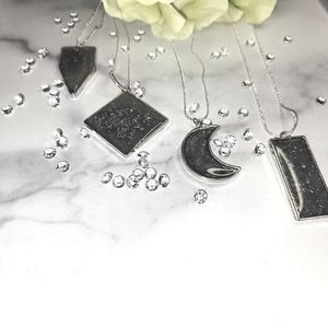 Resin filled Grey necklace on a silver plated chain